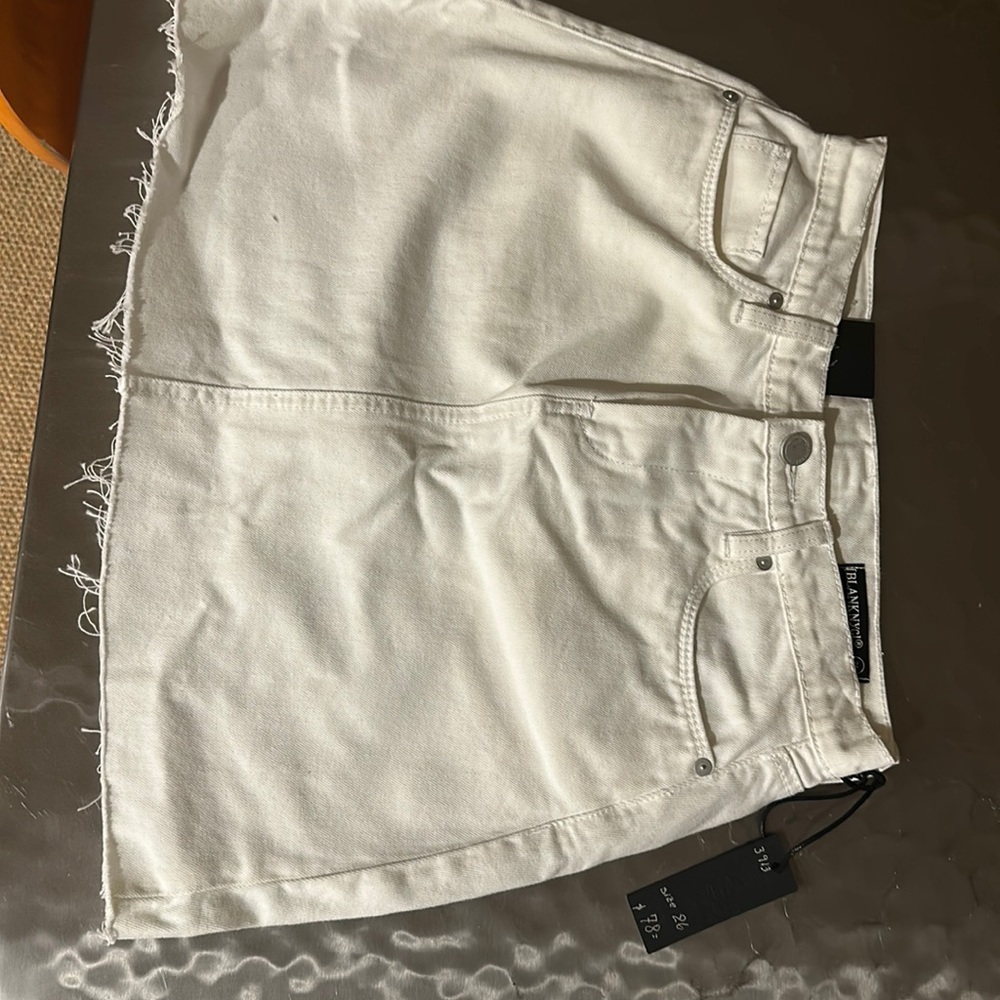 NWT BlankNYC White denim skirt...frayed hem, length:15 inch.